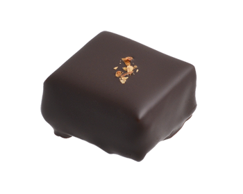 Čokoládově smetanová ganache s ajervúdskym kořenitým čajem a chilli v hořké čokoládě