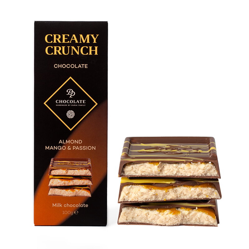 Tabuľka Creamy Crunch – Mandľová s mangom a marakujou (100g) Tabuľka Creamy Crunch – Mandľová s mangom a marakujou (100g)